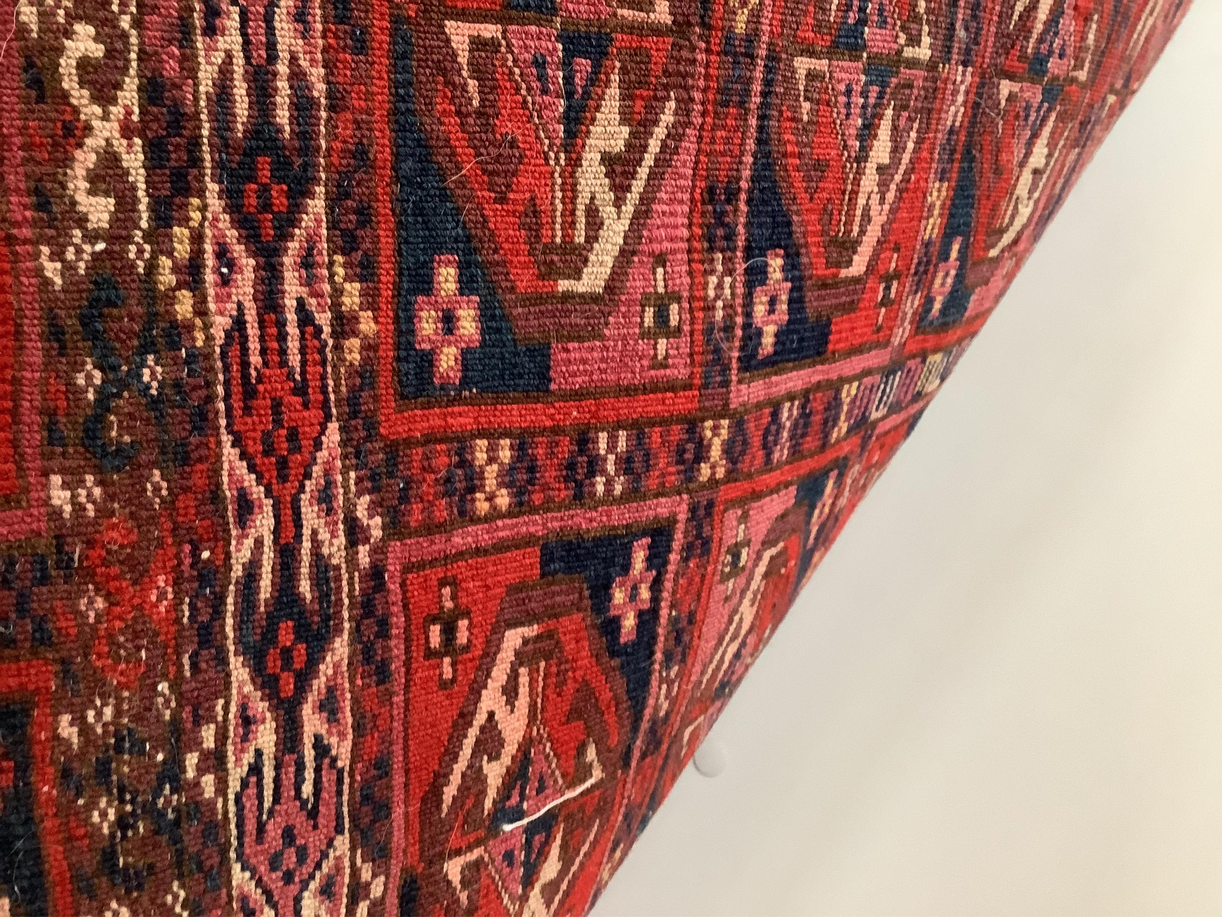Three assorted Caucasian/ Bokhara rugs, largest 150 x 134cm. Condition - fair